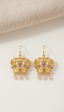 Gold crown statement earrings